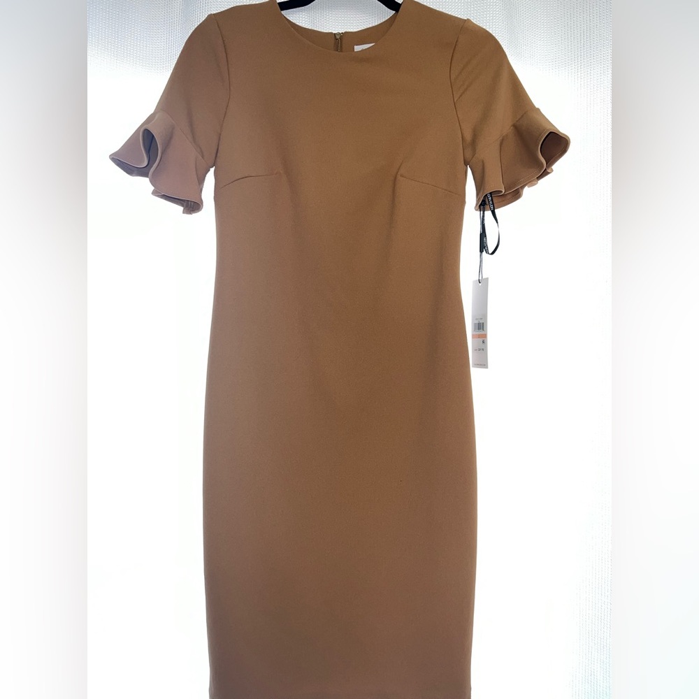 Cocktail/casual business dress.